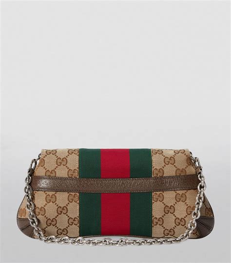 gucci purse with horseshoe|Horsebit Chain Bags .